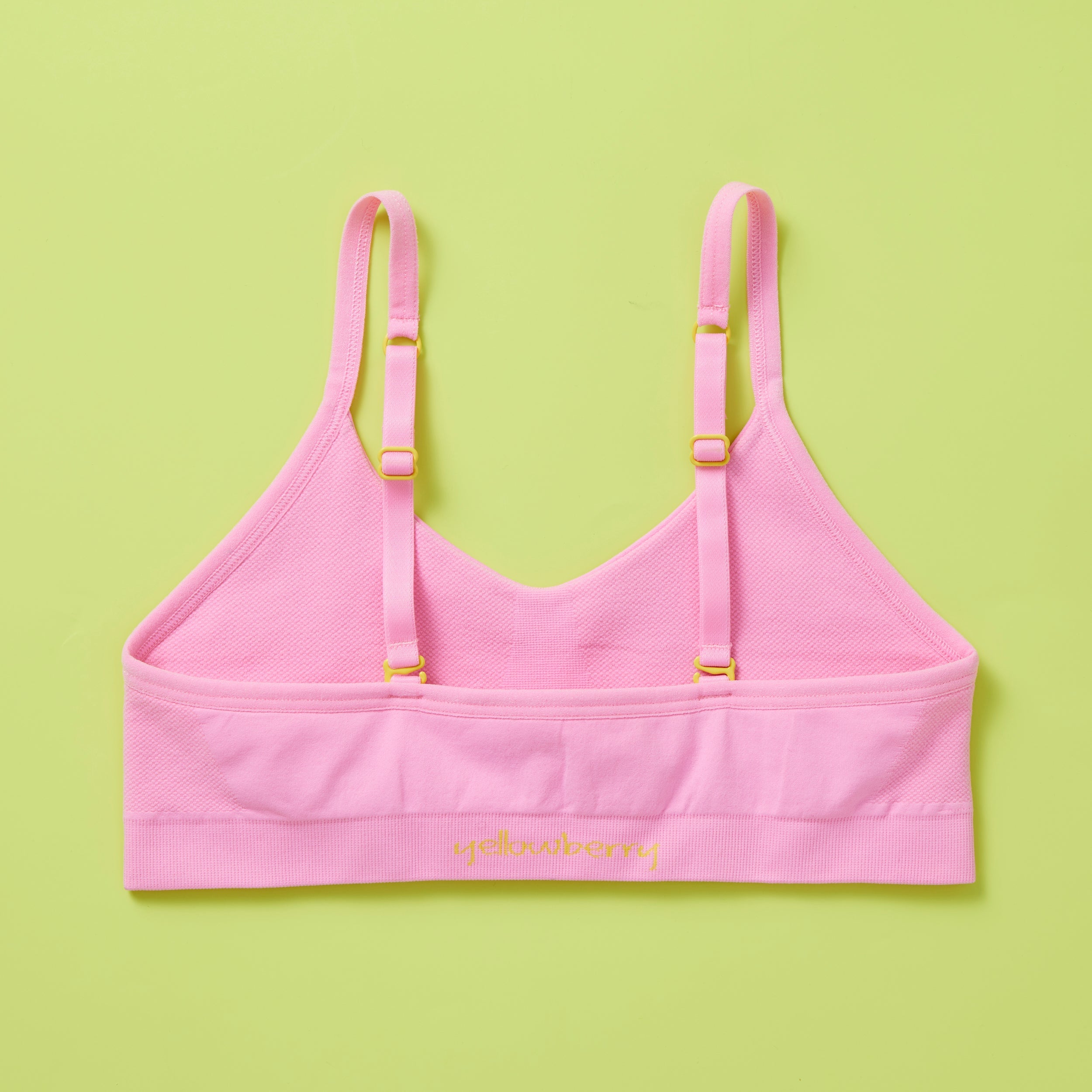 Our Tulip Bra is updated with softer and slightly thicker fabric, peony (pink) back. We added gentle ruching to allow room and support for development and growing girls. The Tulip bra is a fantastic option for all girls in search of an everyday, blissfully soft and comfortable addition to their top drawers.