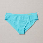 Yellowberry Twistr Seamless Underwear in Fremont (aqua blue color) on a neutral background. These underwear are true seamless, high quality girls underwear and made with super soft fabrics. Girl and mom approved!