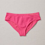 Yellowberry Twistr Seamless Underwear in Watermelon (deep pink color) on a neutral background. These underwear are true seamless, high quality girls underwear and made with super soft fabrics. Girl and mom approved!