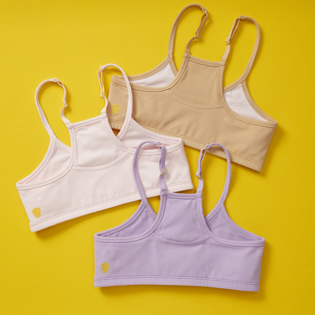 Close-up group photo of Yellowberry Willow Everyday Cotton Bra Bundle of Three offering light to medium all-day support. Available extended sizes for all girls, tweens, and teens.