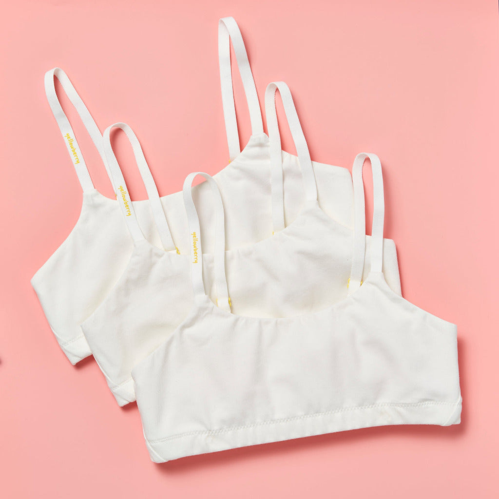 https://www.yellowberrycompany.com/cdn/shop/products/Yellowberry_beginner_pipit_cotton_first_bra_no_underwire_beginner_bundle_of_three_white_color_1200x.jpg?v=1646936030