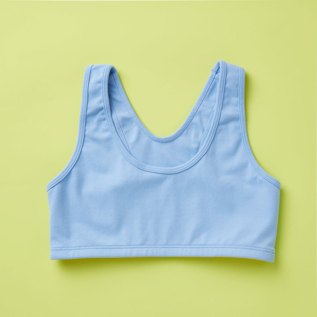 Laydown detail front image of Half Moon Bra in light blue. Our original, first-ever sports bra. Now as a newly redesigned and improved high-impact style. Featuring a wider width racerback and buttery soft fabric, this is the ideal choice for running, jumping, training, and more. This style is built for high-impact activity, offering full support no matter what. 
