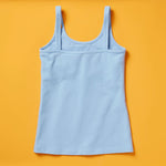 the Shell Cami, a snug, fitted tank designed with a shelf bra. The Shell makes a great option for girls who aren’t quite ready to commit to a bra but are still looking for a little bit of support.