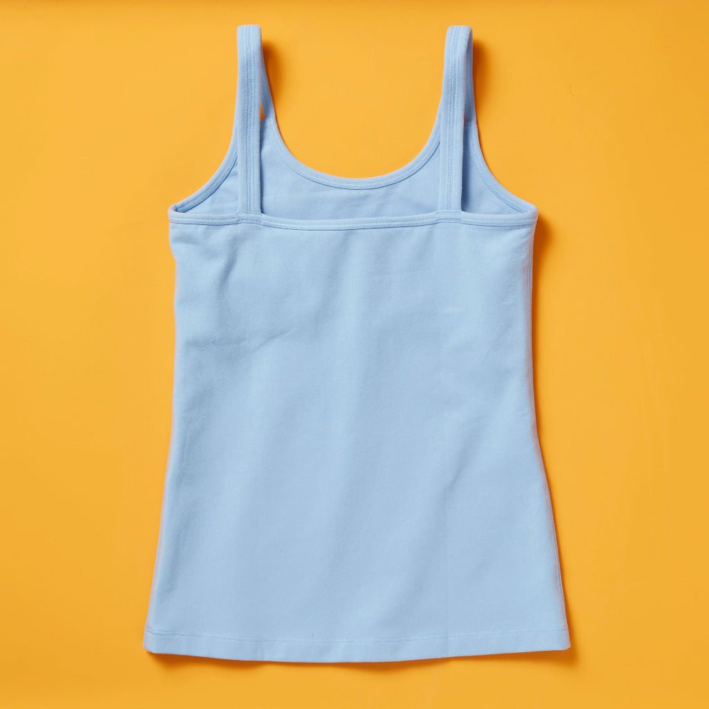 the Shell Cami, a snug, fitted tank designed with a shelf bra. The Shell makes a great option for girls who aren’t quite ready to commit to a bra but are still looking for a little bit of support.