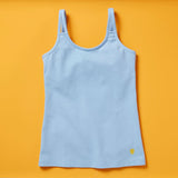 the Shell Cami, a snug, fitted tank designed with a shelf bra. The Shell makes a great option for girls who aren’t quite ready to commit to a bra but are still looking for a little bit of support.