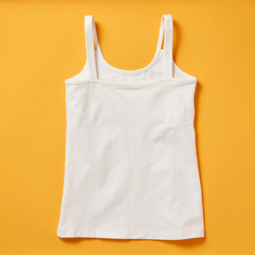 the Shell Cami, a snug, fitted tank designed with a shelf bra. The Shell makes a great option for girls who aren’t quite ready to commit to a bra but are still looking for a little bit of support.