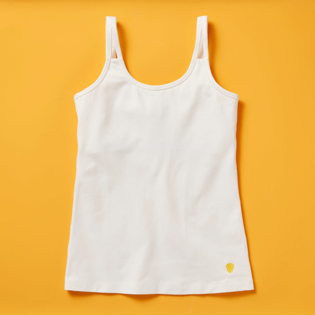 the Shell Cami, a snug, fitted tank designed with a shelf bra. The Shell makes a great option for girls who aren’t quite ready to commit to a bra but are still looking for a little bit of support.