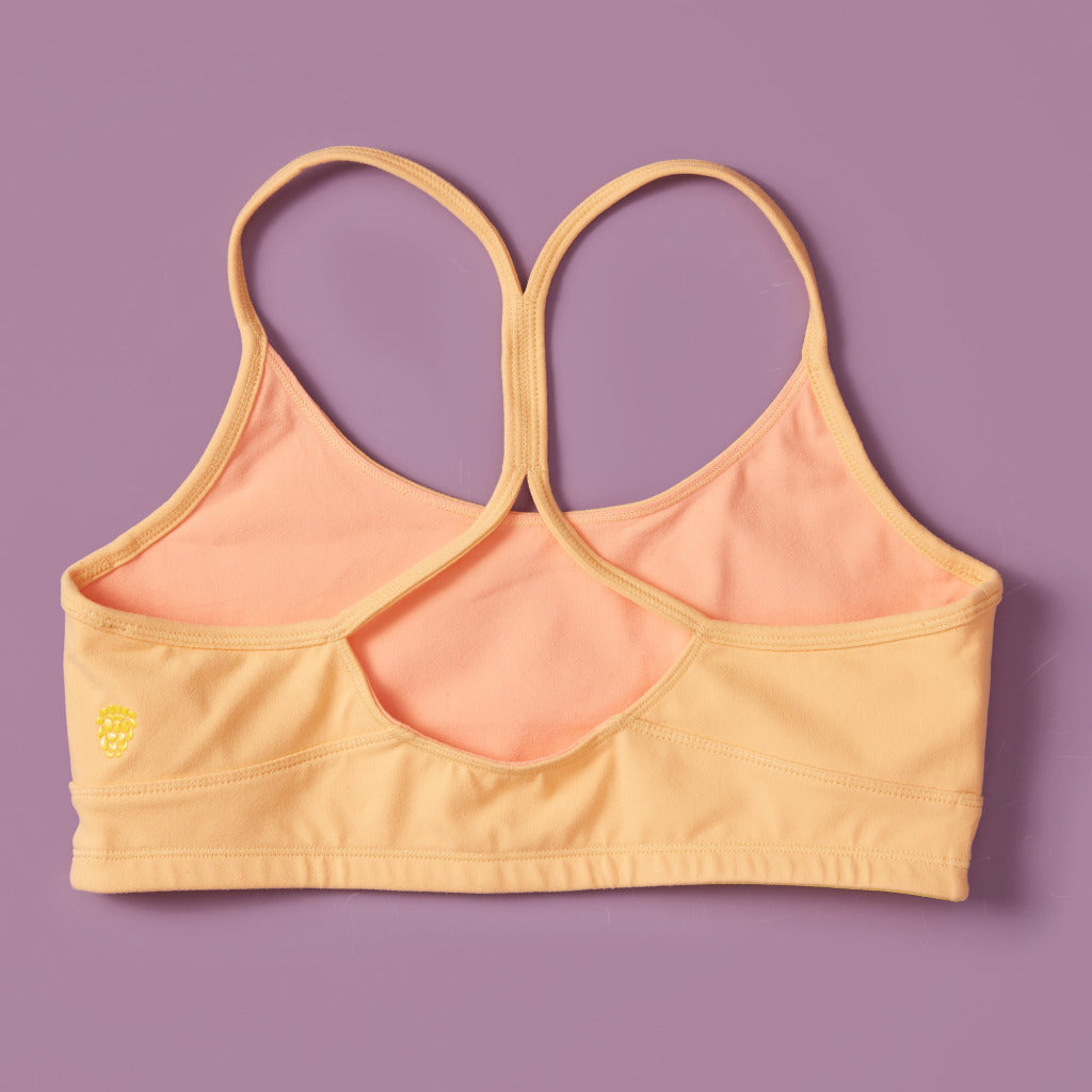 High to medium support sports bra for girls. A Great training bra too. Created by a female founded, female owned company.