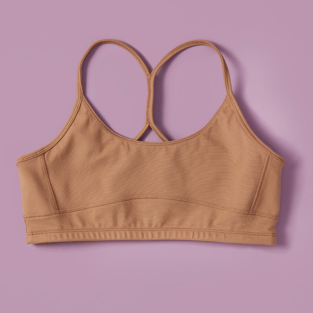 High-quality, all-natural, antimicrobial high to medium support sports bra for girls. A Great training bra too. Created by a female founded, female owned company.