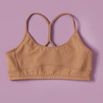 High-quality, all-natural, antimicrobial high to medium support sports bra for girls. A Great training bra too. Created by a female founded, female owned company.
