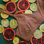Styled detail image of Yellowberry Wish Bra in mocha. The Wish Bra is double-layered and fully lined to ensure full coverage. Softest fabrics, AND made by a female founded company.