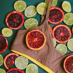 Styled detail image of Yellowberry Wish Bra in mocha. The Wish Bra is double-layered and fully lined to ensure full coverage. Softest fabrics, AND made by a female founded company.