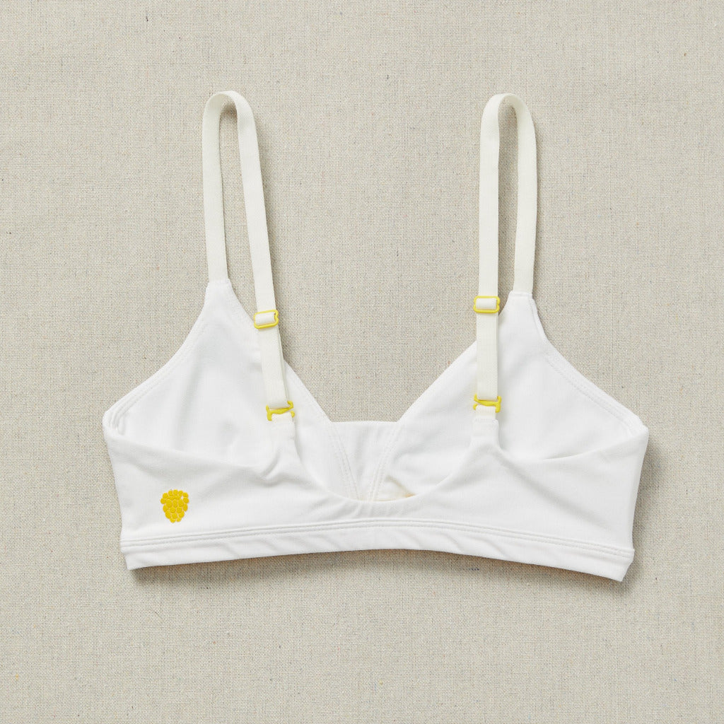 Back close detail image of Yellowberry Wish Bra in white. 