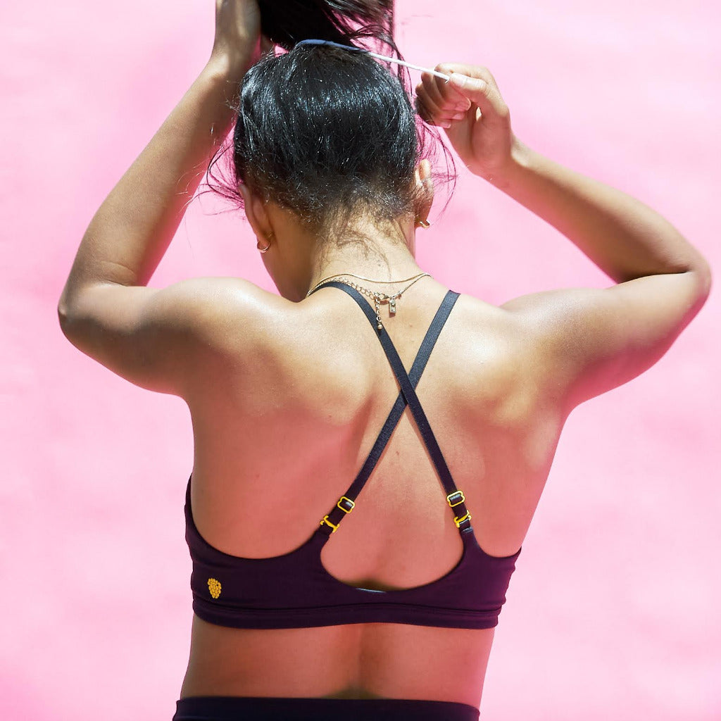 Girl wearing Yellowberry Wish Training Bra for More Developed girls, teens, and tweens. Straps are convertible and adjustable to be the best fit.
