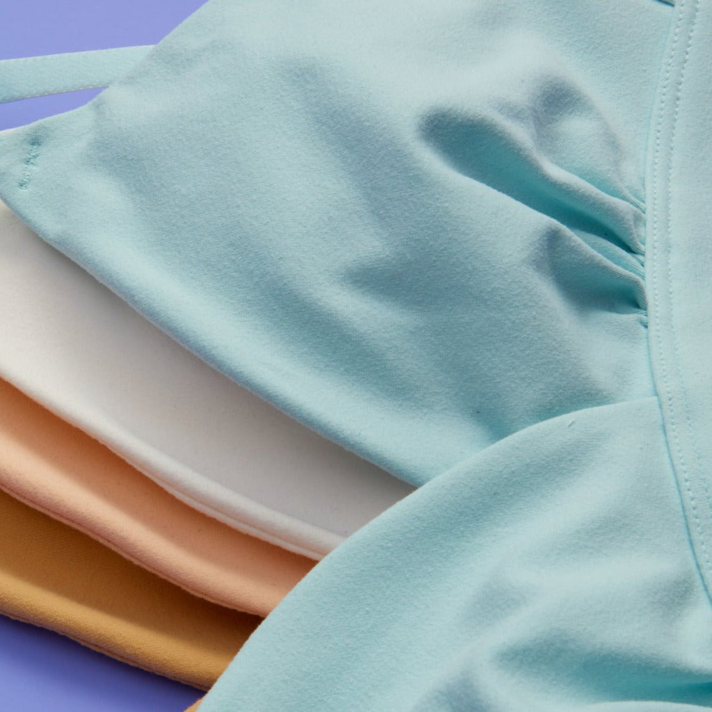 Yellowberry Butter Bra close-up detail image of the cup detail. The BEST Bra We Make for More Developed Girls. Fabric is smooth to the touch and made with a matte brushed finish for extra softness. Made with synthetic fabric blend and hook and eye clasp closure. Great for developing girls. Wear and wash is over and over again, it will still look brand new. It will grow with your daughter as she continues to grow, great option for any occasion.