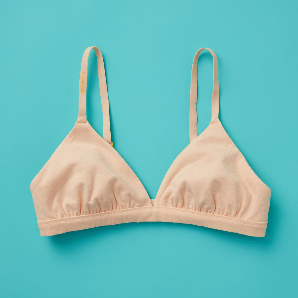 Yellowberry’s Joey Bra for Girls: A bra that grows with you. Made with double layered cotton-spandex fabric (great for sensitive skin!) just for girls beginning to develop. Front laydown beige.