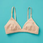 Yellowberry’s Joey Bra for Girls: A bra that grows with you. Made with double layered cotton-spandex fabric (great for sensitive skin!) just for girls beginning to develop. Front laydown beige.